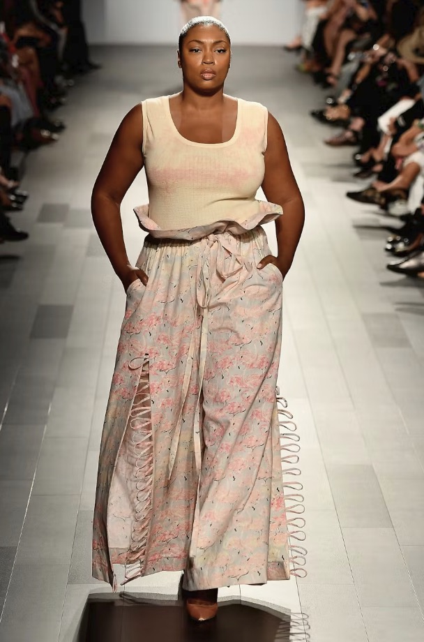 Liris Crosse in a red gown portrait